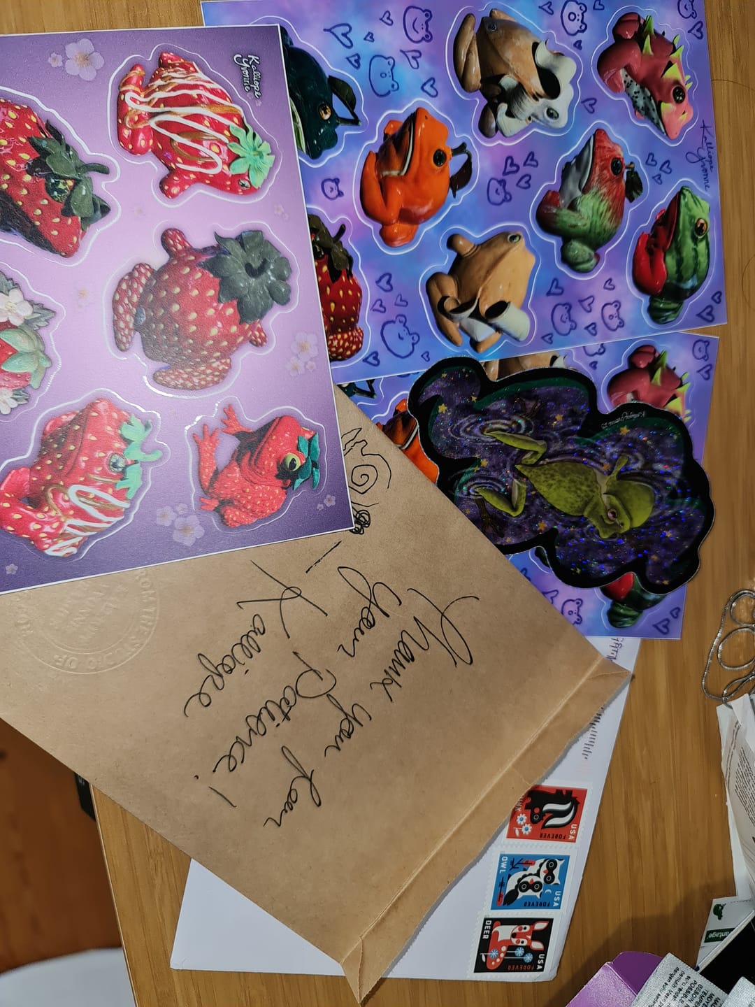 Customer photo review of Limited Edition "The Fruit Frogs of '24" Glossy Vinyl Sticker Sheet