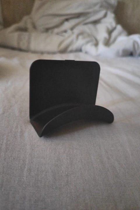 Customer photo review of Universal Headphone Stand – Under-Desk Headset Hanger