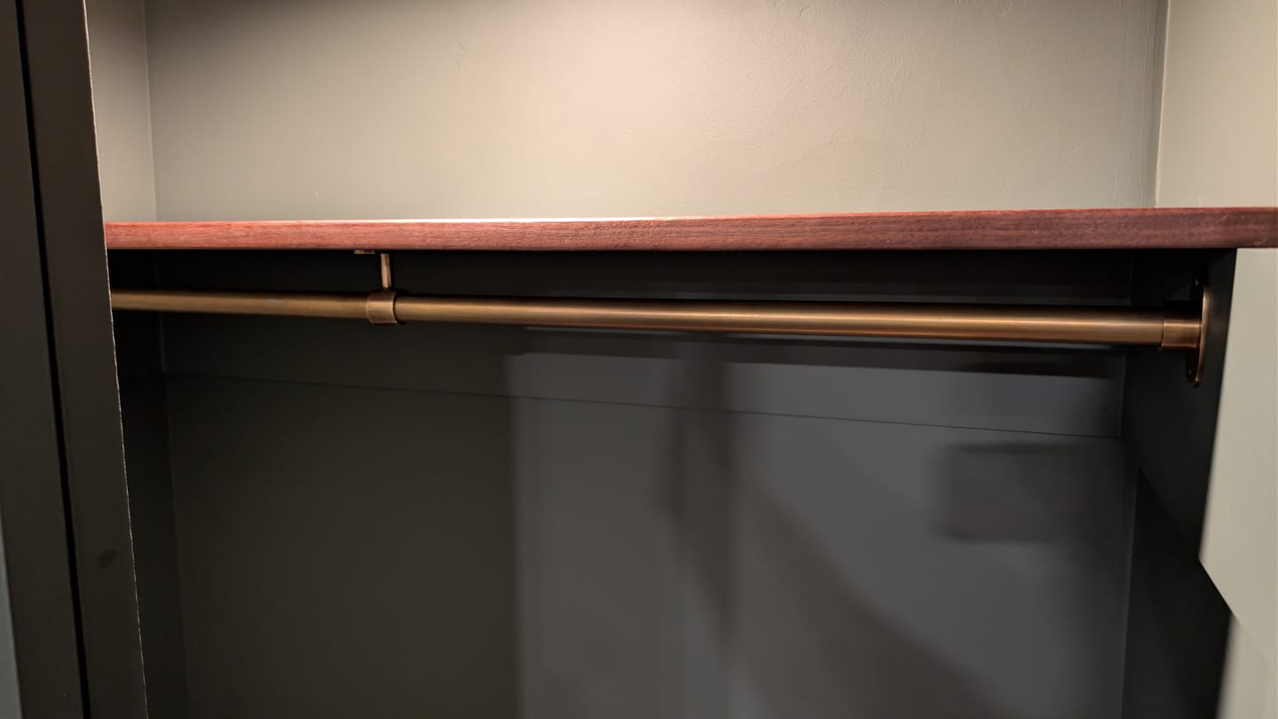 Customer photo review of Closet Rod – Antique Brass