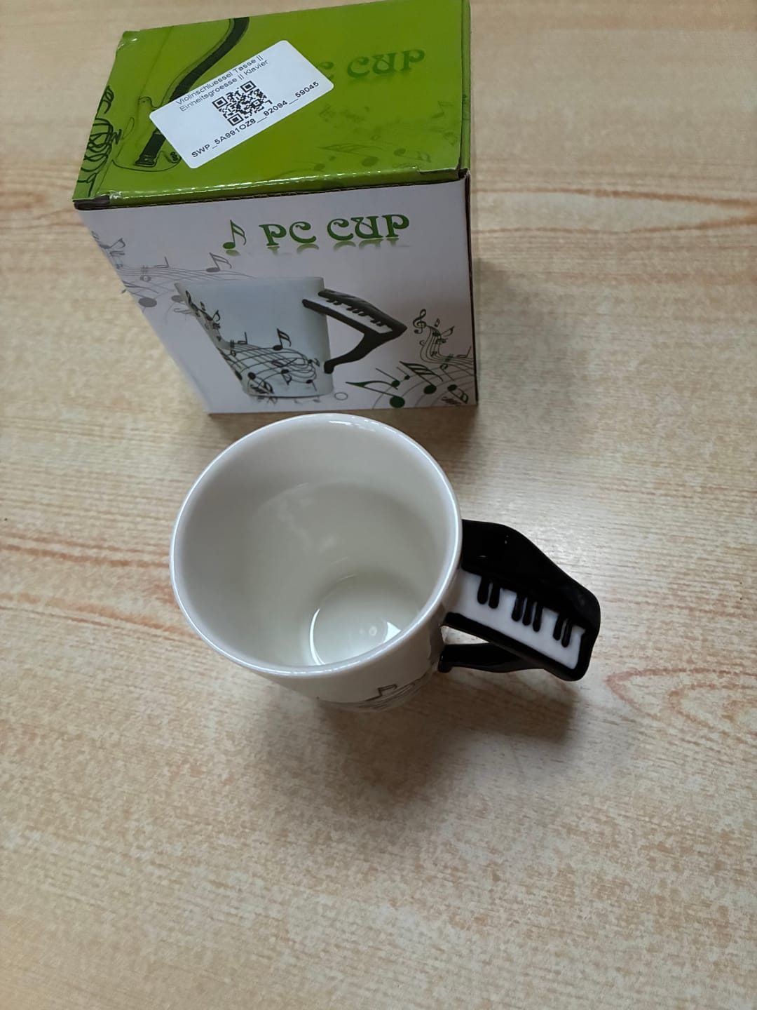 Customer photo review of Originelle Tasse – Klavier