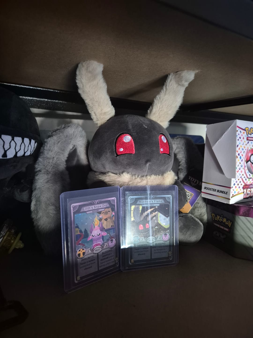 Customer photo review of Motthew | Mothman Plush 🦋 + Motthew's Flame Holo Promo Card