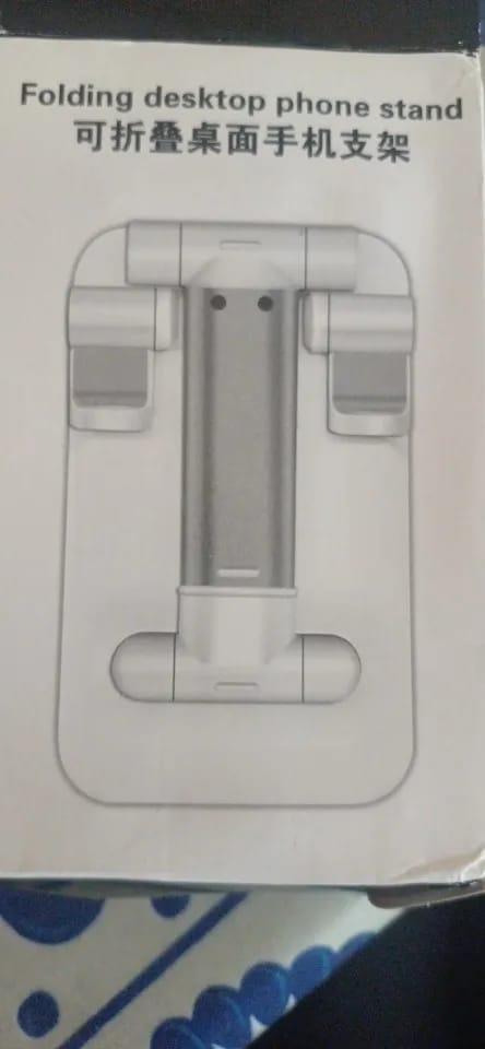 Customer photo review of Adjustable Phone & Tablet Stand – Universal Foldable Desk Holder
