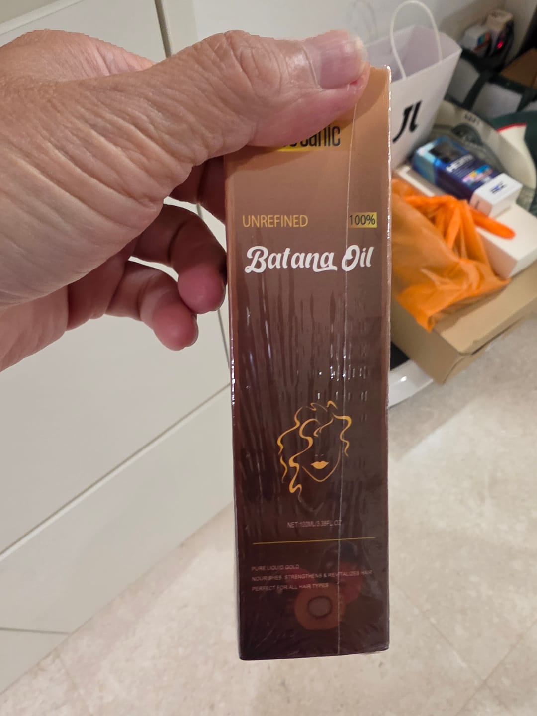 Customer photo review of Batana Liquid Oil