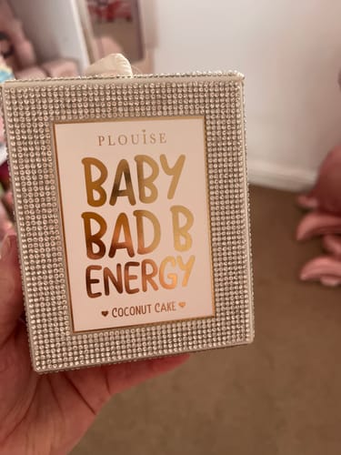 Reviewer holding the sparkly box for the Crystal Baby Bad B Energy Mini Lip Duo.