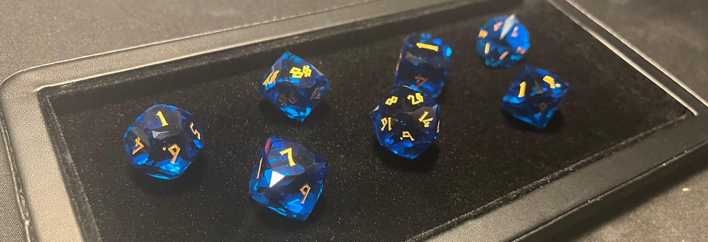 Customer photo review of Aquamarine Multifaceted Glass Dice Set