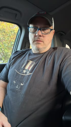 Vasquez J. wearing Uncle Sam Cat - Premium