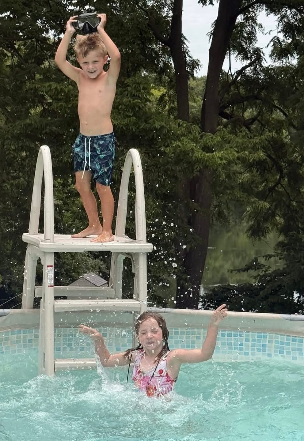 Customer photo review of Shuck Yeah Boy's Swim Trunks in Navy