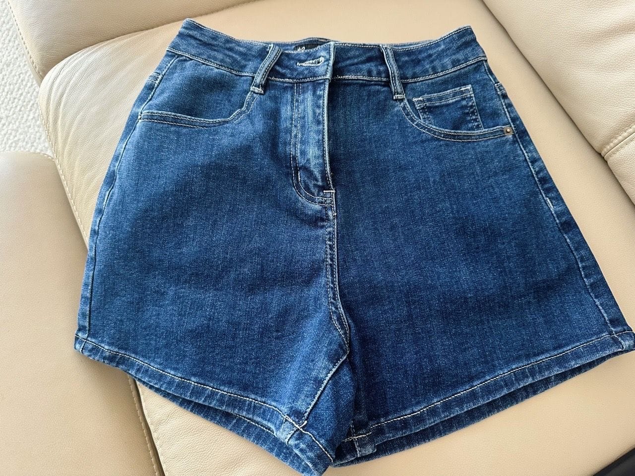 Customer photo review of Mid-Waisted Stretch Denim Shorts