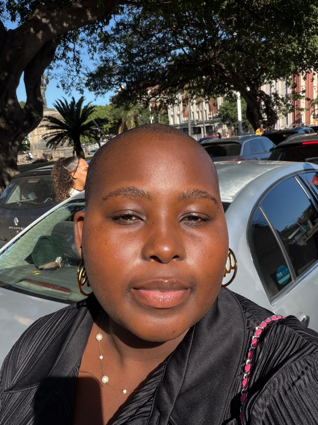 Customer photo review of Gold Luxe Logo Hoops