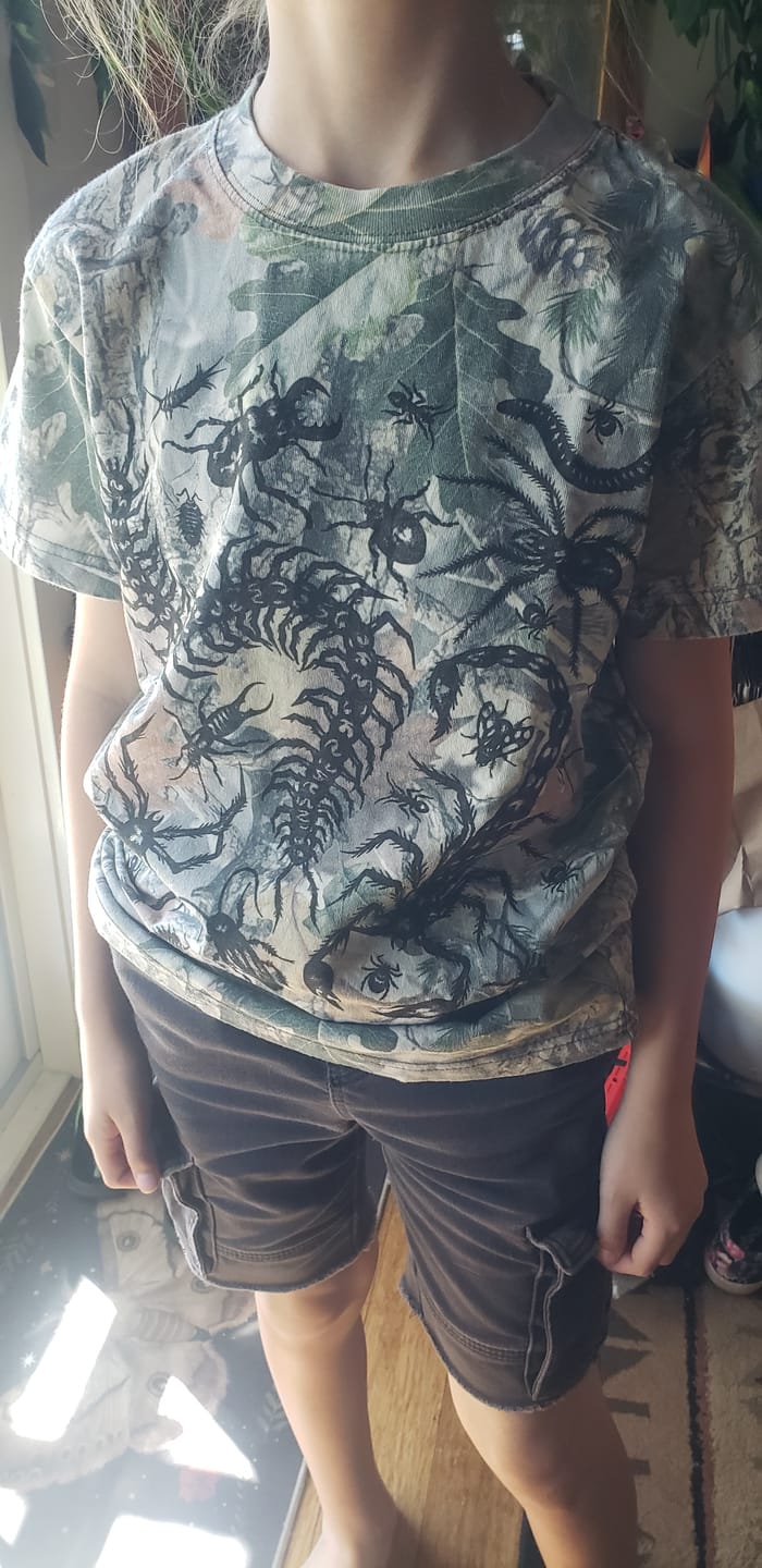 Customer photo review of Kids Camo Bug Oversized Tee