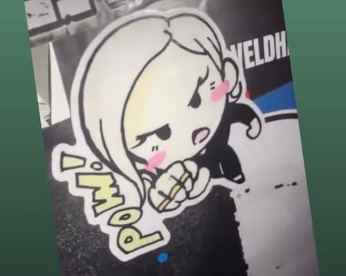 Customer's custom vinyl sticker of a cartoon girl in an action pose with the word 'POW!' in yellow.