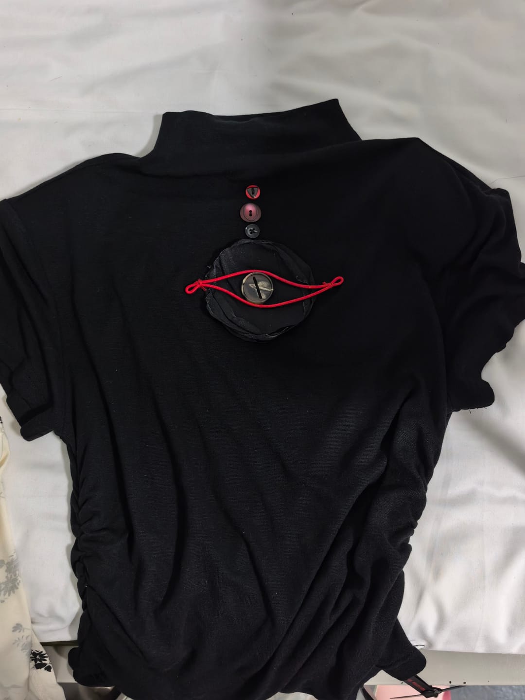 Customer photo review of DOINDULGE Ruched Fitted Tee with Deconstructed Eye Button Detail