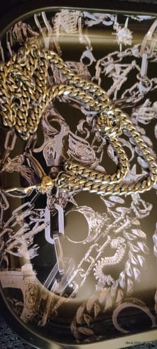 Customer photo review of SCYTHE SKULL PENDANT