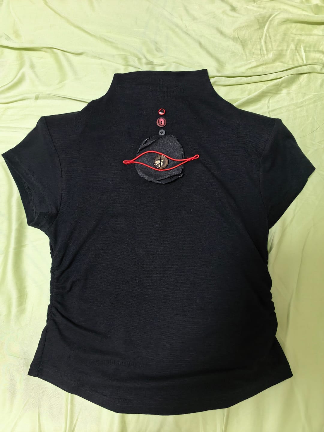 Customer photo review of DOINDULGE Ruched Fitted Tee with Deconstructed Eye Button Detail