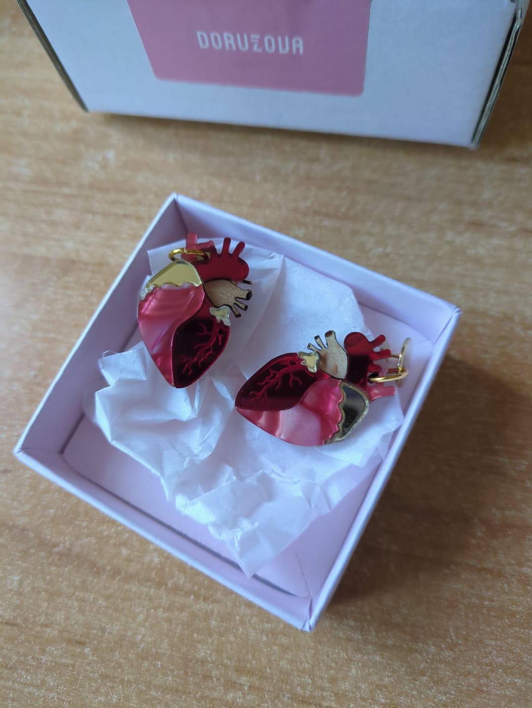 Customer photo review of Anatomical Heart Earrings - red