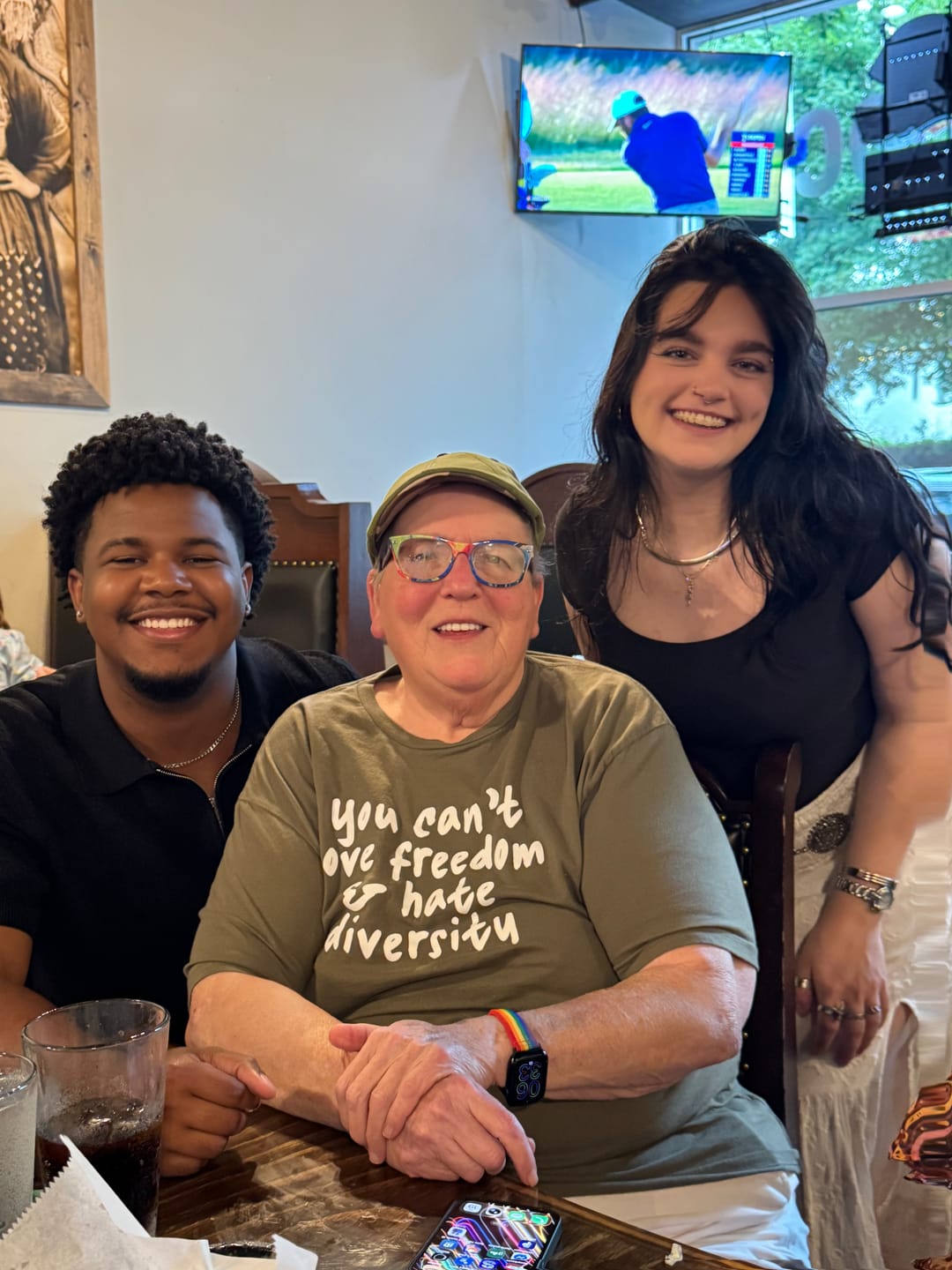 Customer photo review of Love Your Neighbor Means All Your Neighbors Unisex Tee