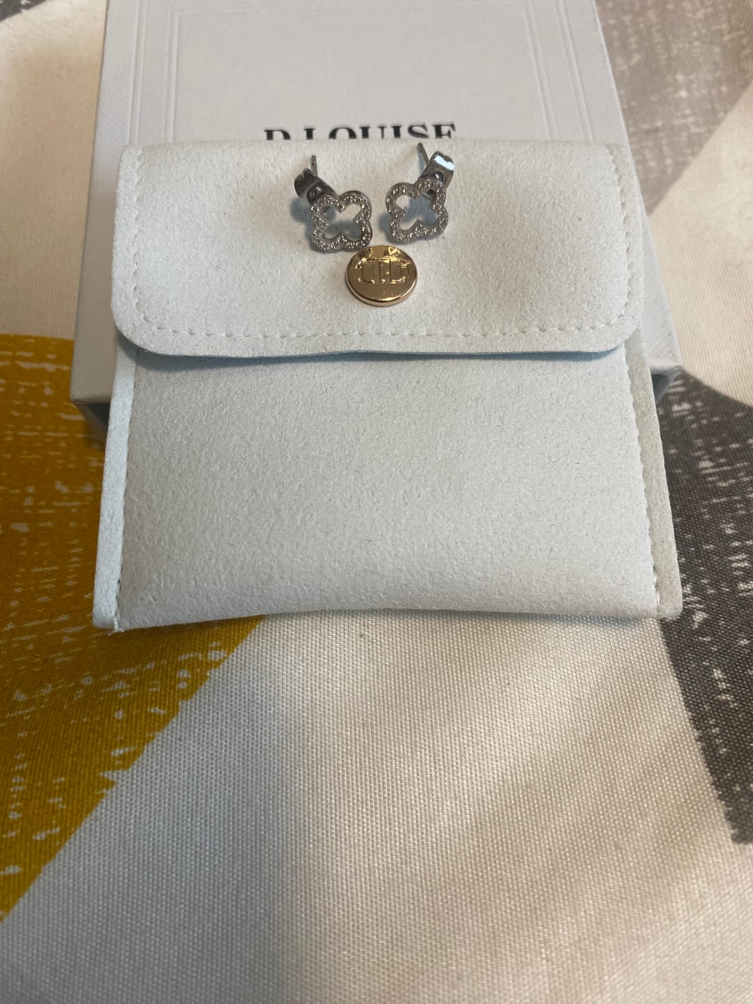 Customer photo review of Pavè Clover Studs