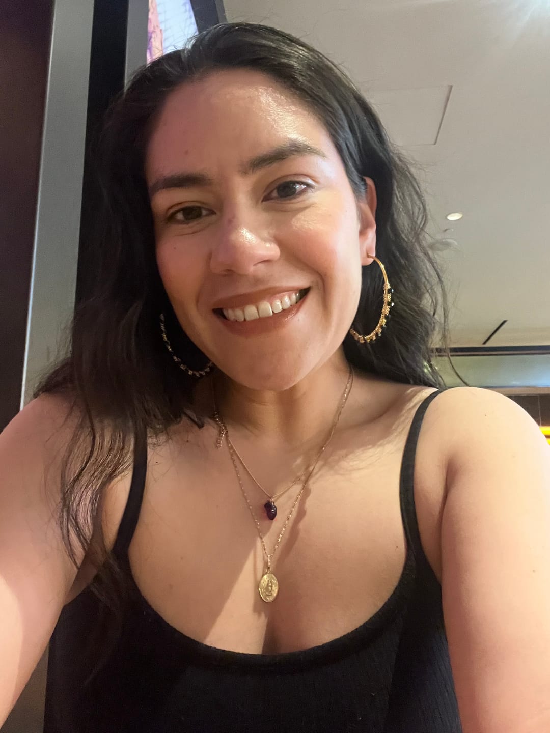 Customer photo review of Emerald Hoop Earrings