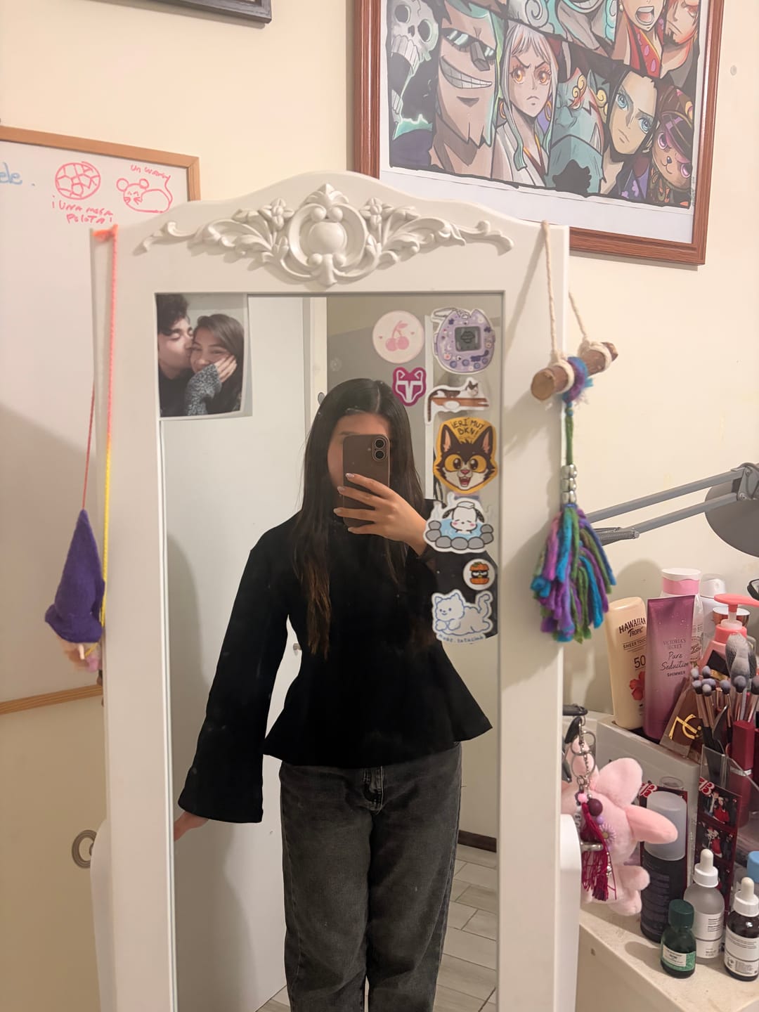 Customer photo review of TOP MIKA NEGRO - POLERA CON PINZAS MANGA LARGA DE ALGODÓN