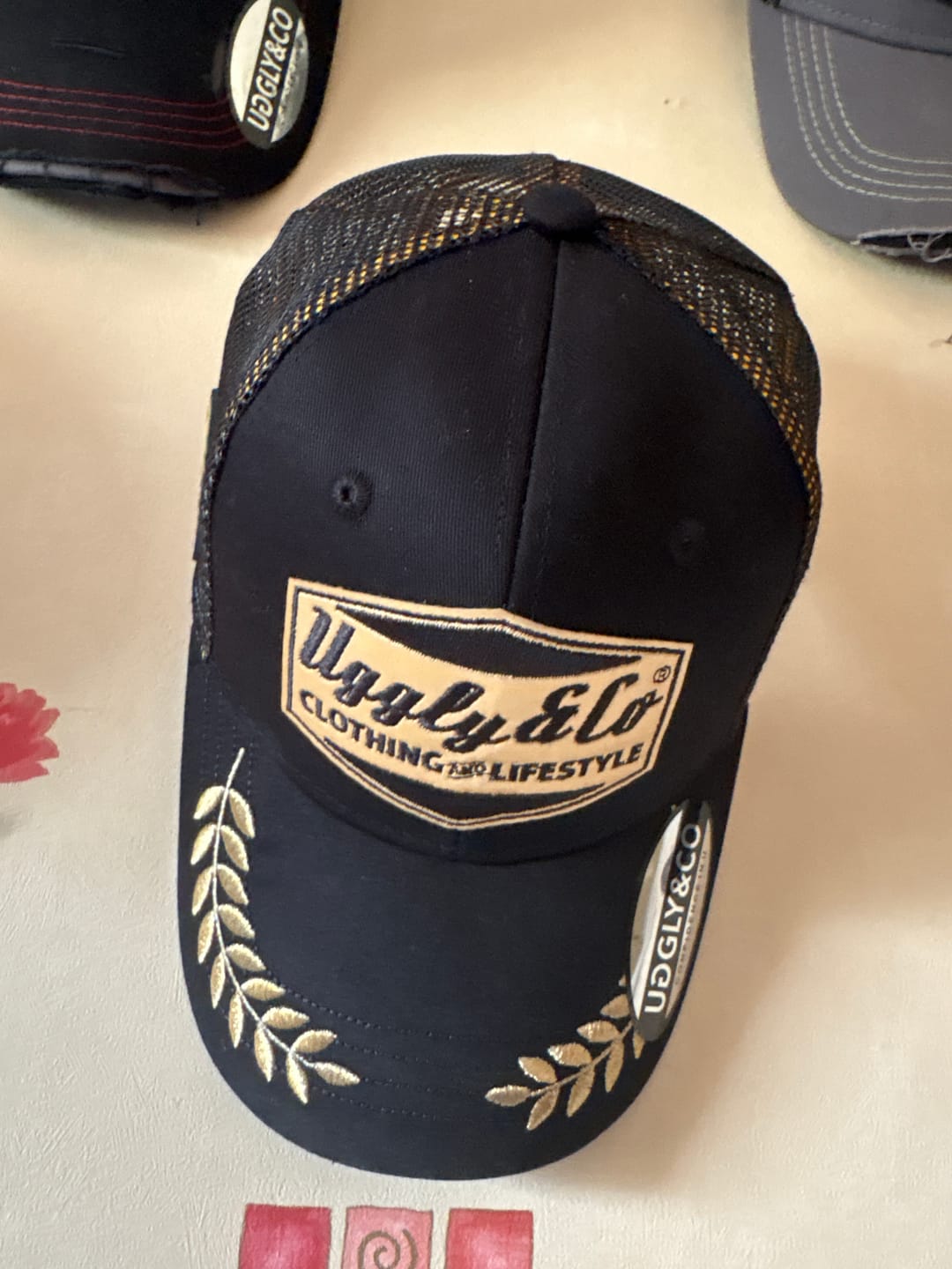 Customer photo review of Black & Gold 'Podium' Diamond Trucker Hat