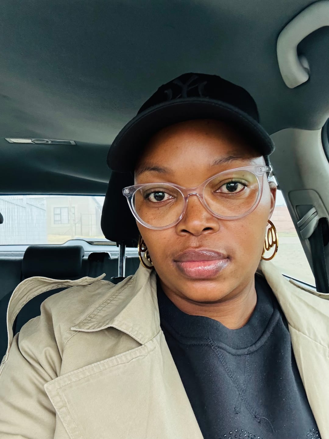 Customer photo review of Gold Luxe Logo Hoops