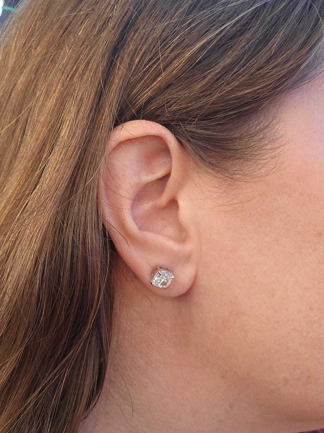 Customer photo review of Louily 1.5 CT Cushion Cut Sterling Silver Women's Stud Earrings