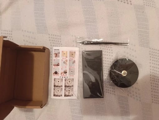 Customer photo review of 3D Acrylic Mirror Wall Clock