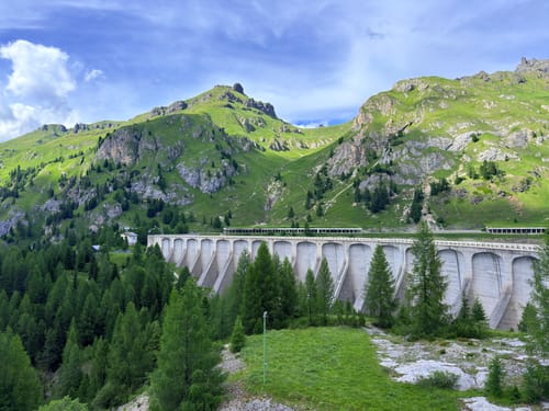 Reviewer's submitted photo of a scenic mountain landscape and a large dam.