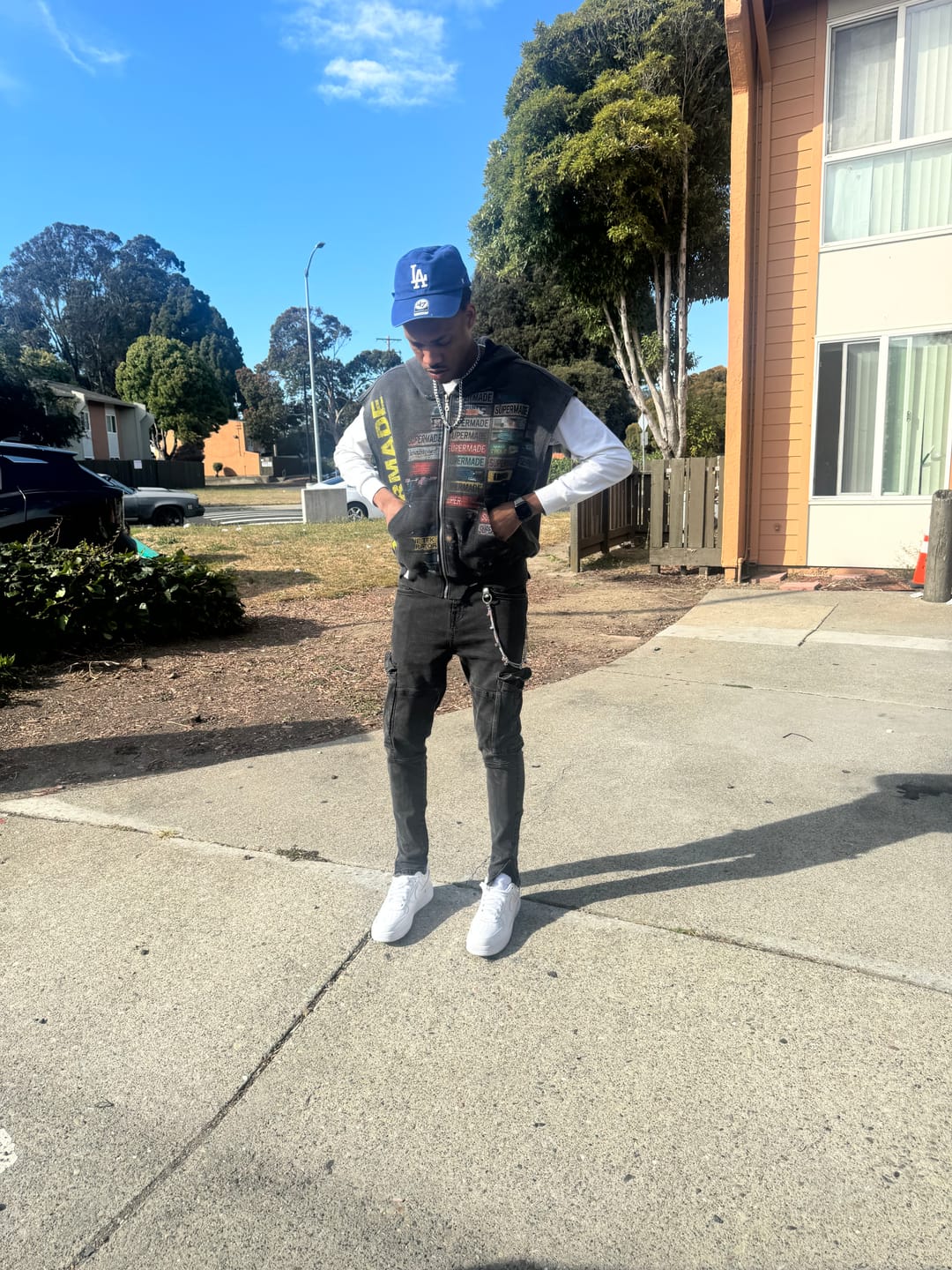 Customer photo review of Distressed Multi-Label Graphic Sleeveless Zip Hoodie