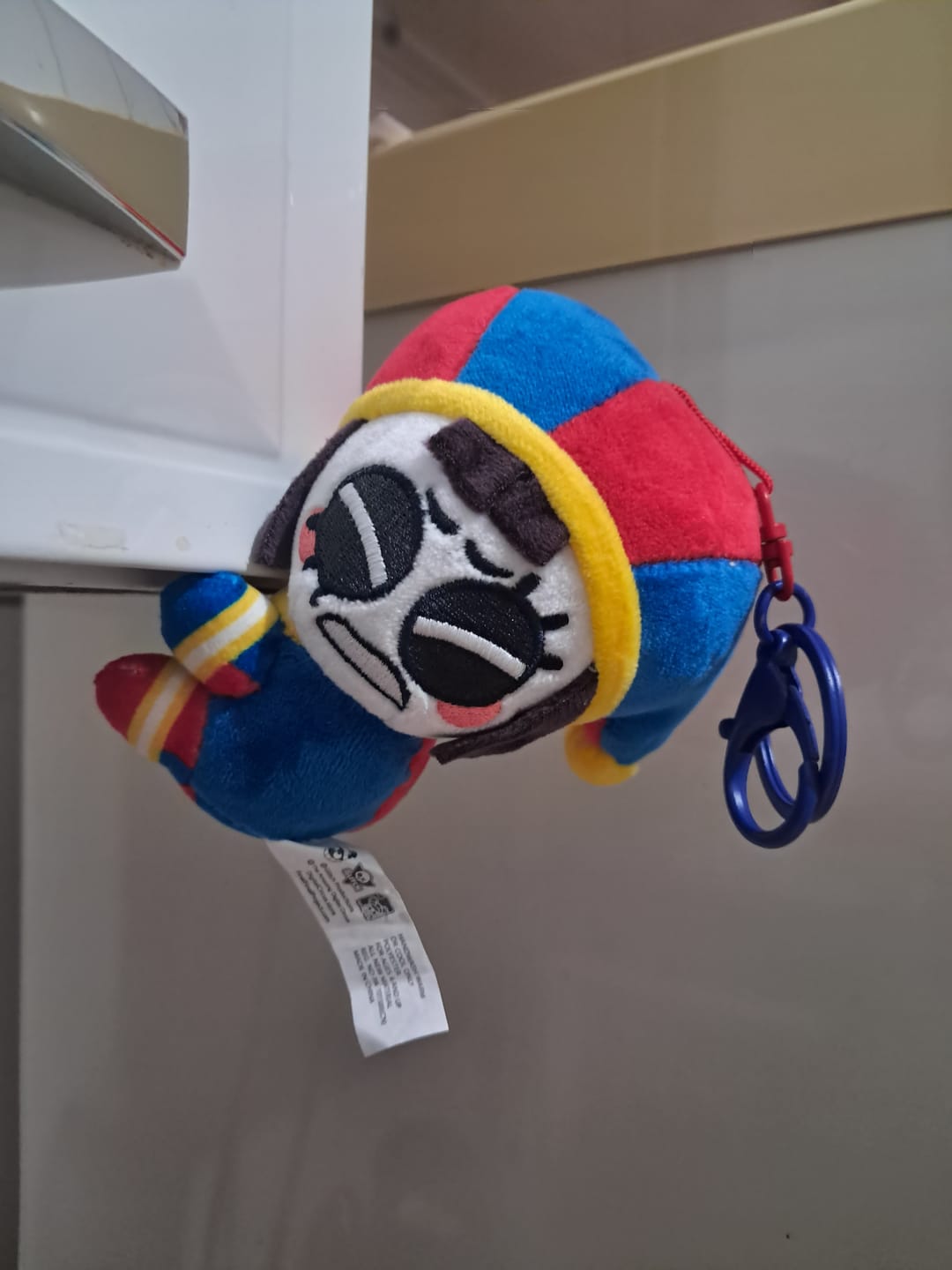 Customer photo review of Pomni & Abstraction Magnetic Plush Keychains