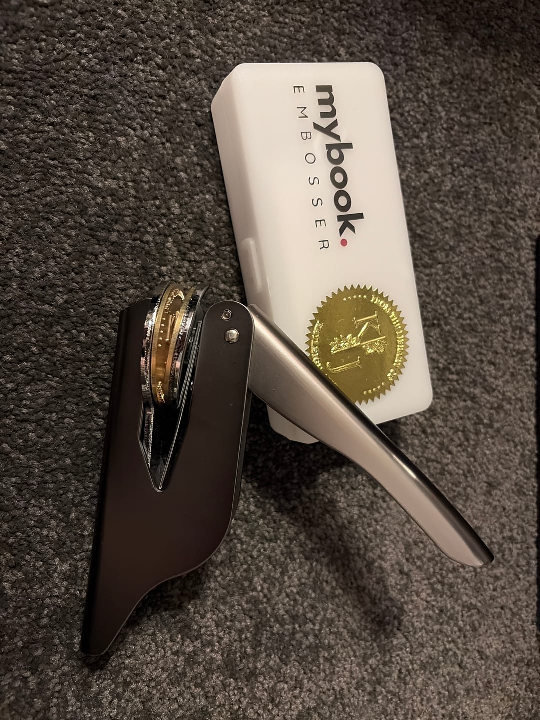 Customer photo review of My Book Embosser – Custom Book Embosser
