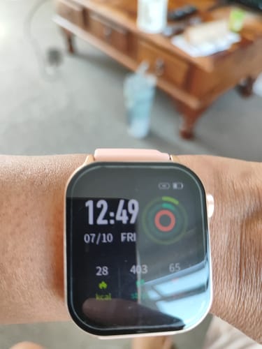 Customer wearing the Gard Pro Health 4 Smartwatch on their wrist, with the digital face displaying time and health metrics.