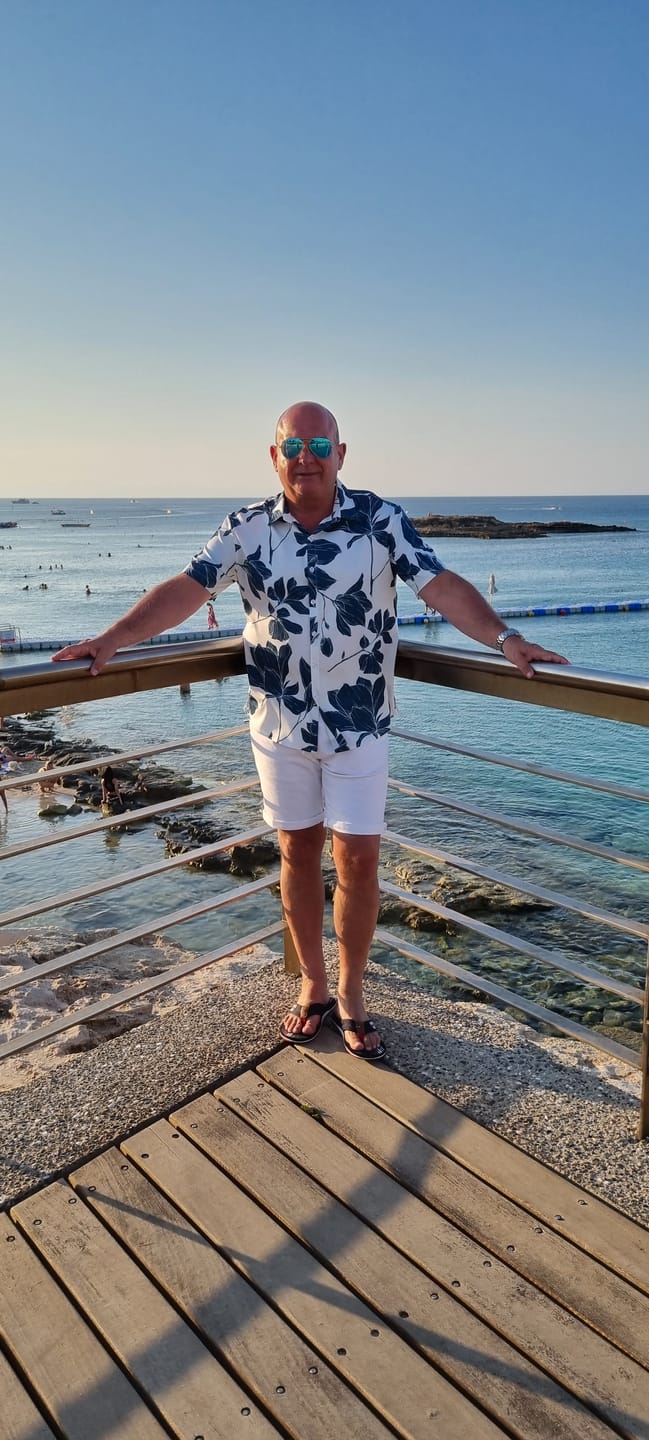 Customer photo review of Men's Summer Casual Floral Button Up Short Sleeve Holiday Cool Beach Shirt