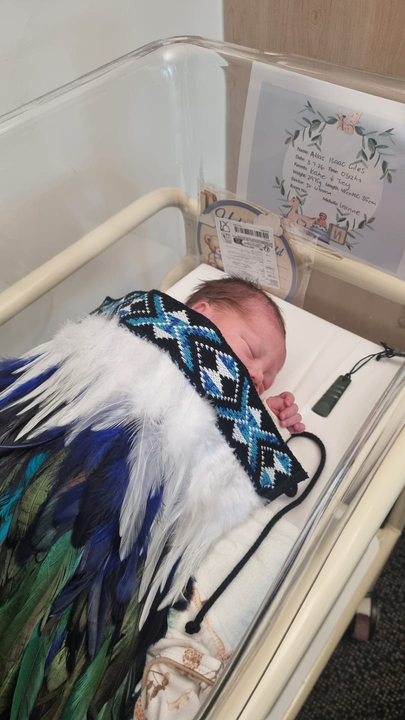 Customer photo review of Paua Blue Newborn Maori Baby Korowai