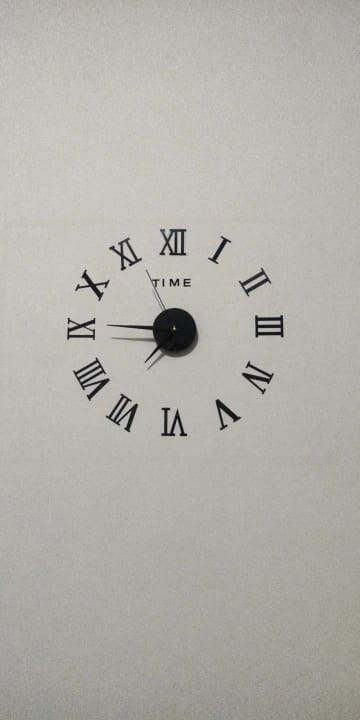 Customer photo review of 3D Acrylic Mirror Wall Clock