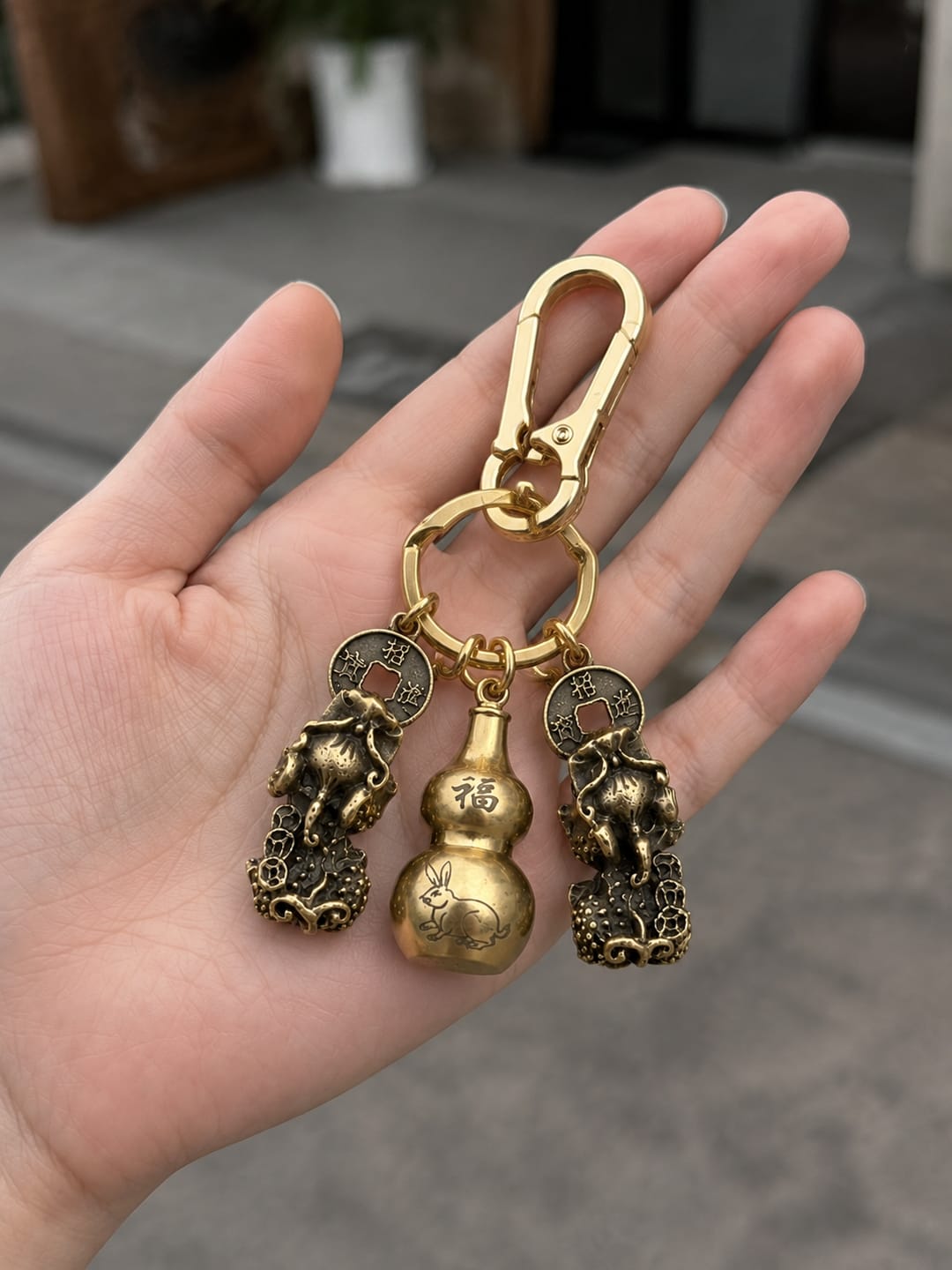 Customer photo review of FuAttract Fortune Protection Prosperity Flow Brass Chinese Zodiac Keychain with Pixiu