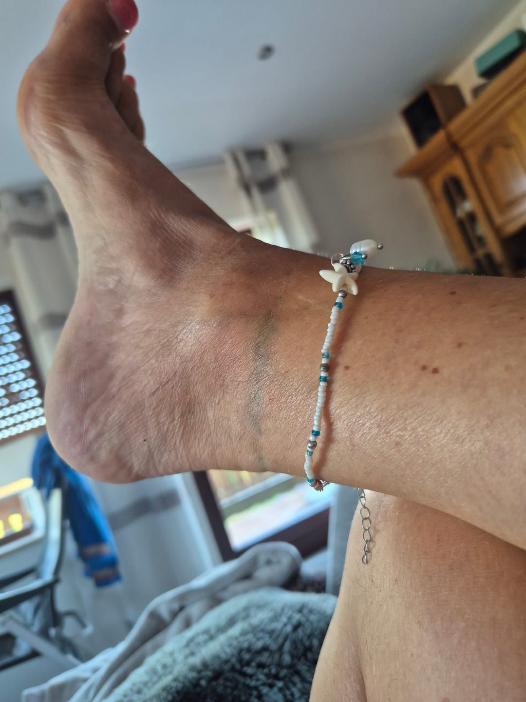 Customer photo review of Olivenorma Fußkettchen mit Süßwasserperlen, türkis, Seestern-Muschel