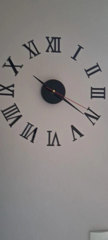 Customer photo review of 3D Acrylic Mirror Wall Clock