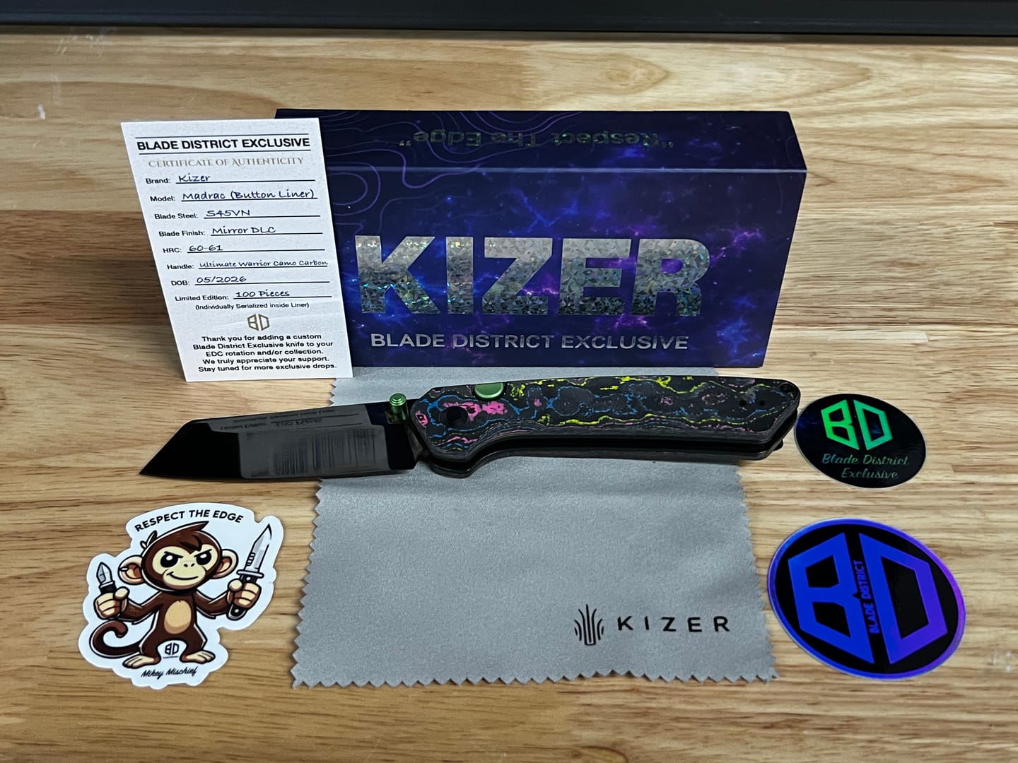 Customer photo review of Kizer Madrac Button Liner Lock Camo Carbon Mirror DLC S45VN BLADE DISTRICT EXCLUSIVE