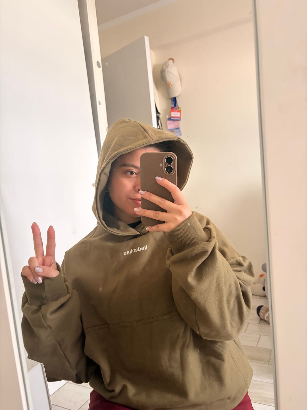 Customer photo review of POLERÓN HOODIE VERDE - OVERSIZE CON GORRO LOGO Y ESPALDA BORDADO
