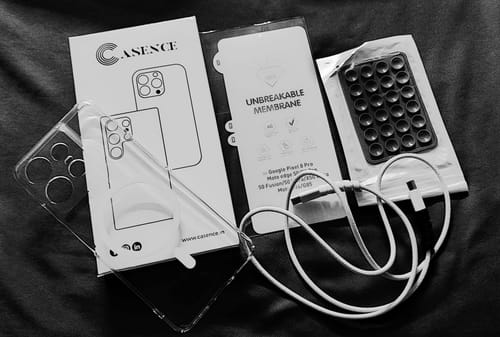 Customer's Anti Yellow Magsafe Clear Case for Motorola Edge 50 Pro laid out with its packaging and accessories.
