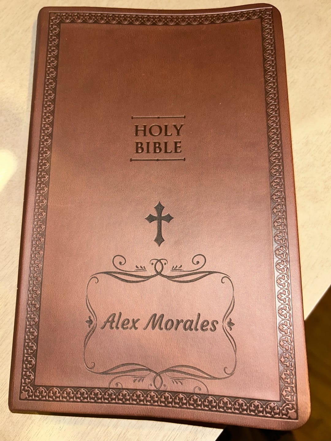 Customer photo review of Personalized NIV Bible Brown Value Thinline - Engraved Cross Icon Floral Frame