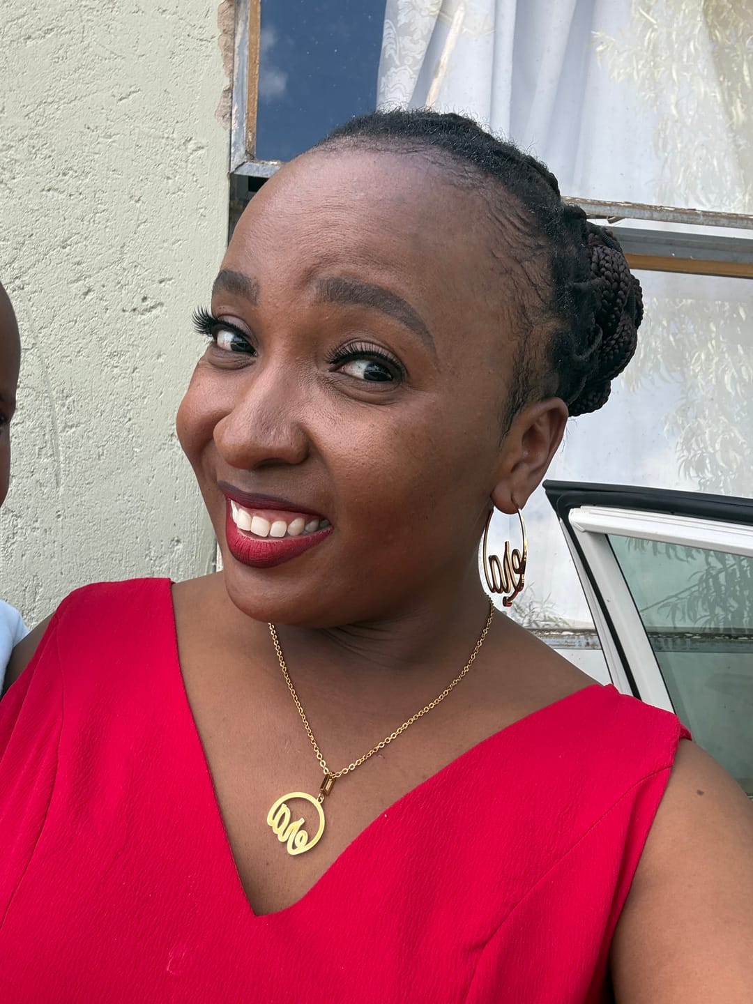 Customer photo review of Gold Luxe Logo Hoops