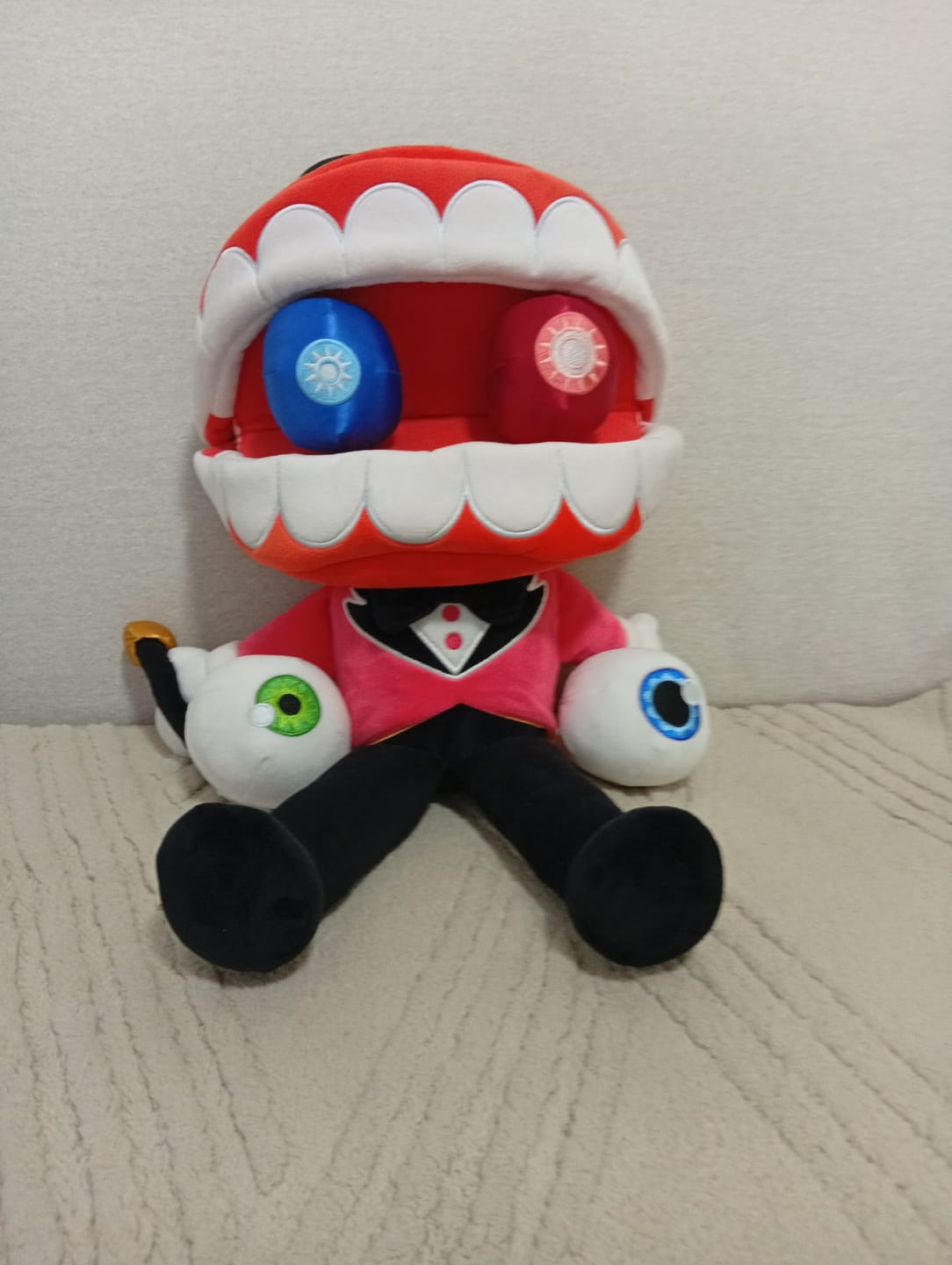 Customer photo review of Caine Puppet Plush