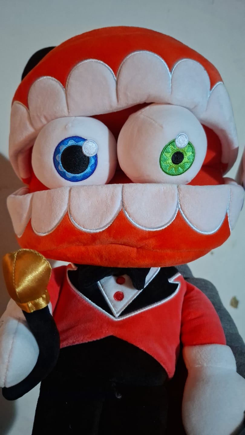 Customer photo review of Caine Puppet Plush