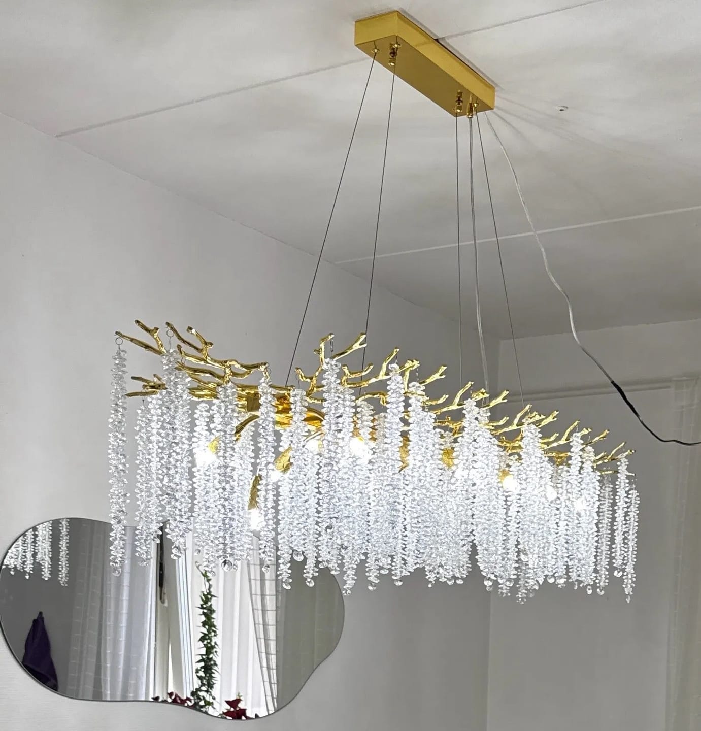 Customer photo review of Żyrandol kryształowy nad stół – złota lampa wisząca do jadalni | AURELIA