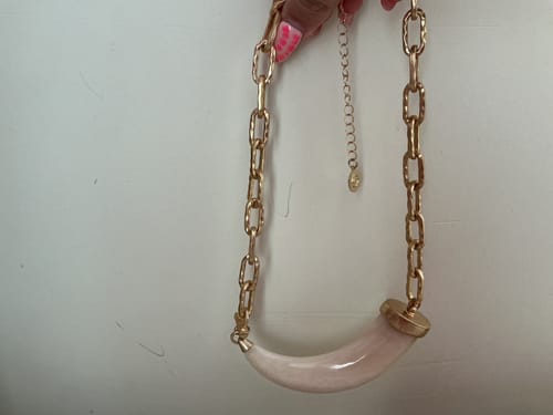 Reseña con foto de un cliente sobre Collar Colmillo
