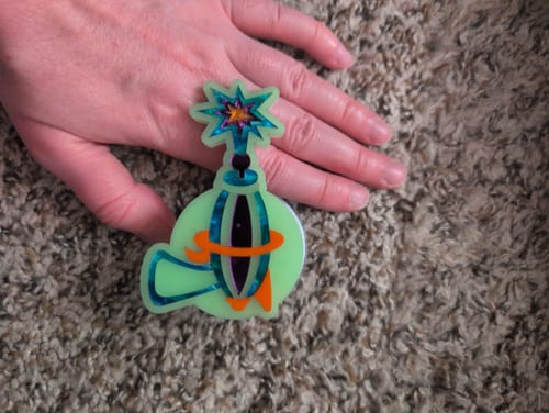 Customer photo review of Ray Gun MagSafe Phone Charm