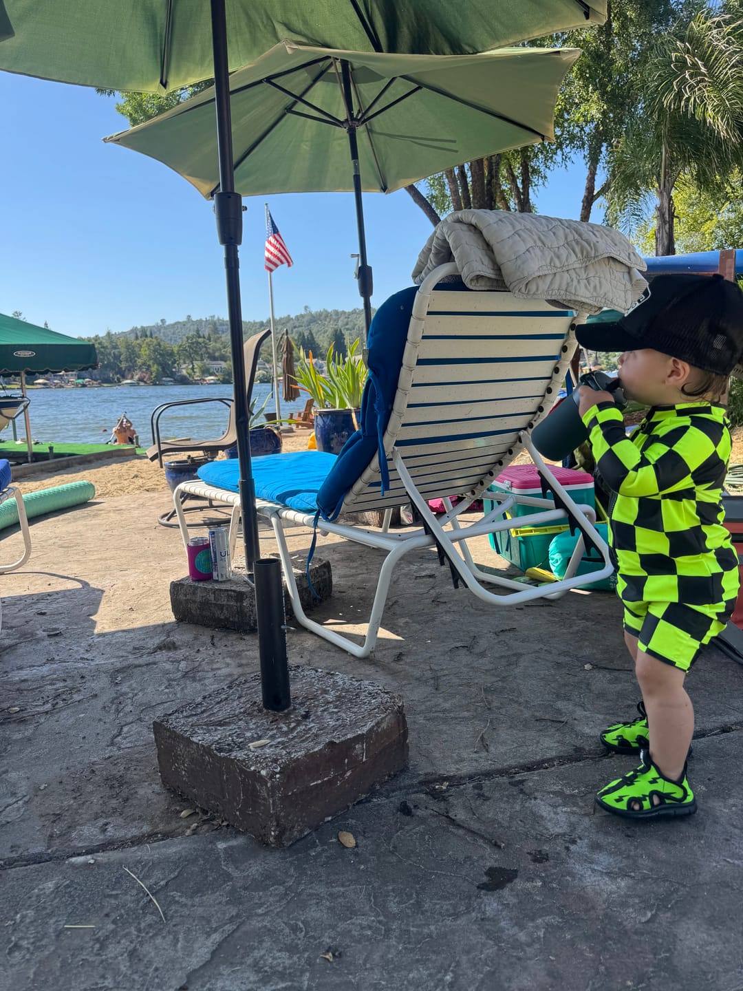 Customer photo review of UPF50+ Boys Swim Romper in Neon Electric Lime + Black Checkered