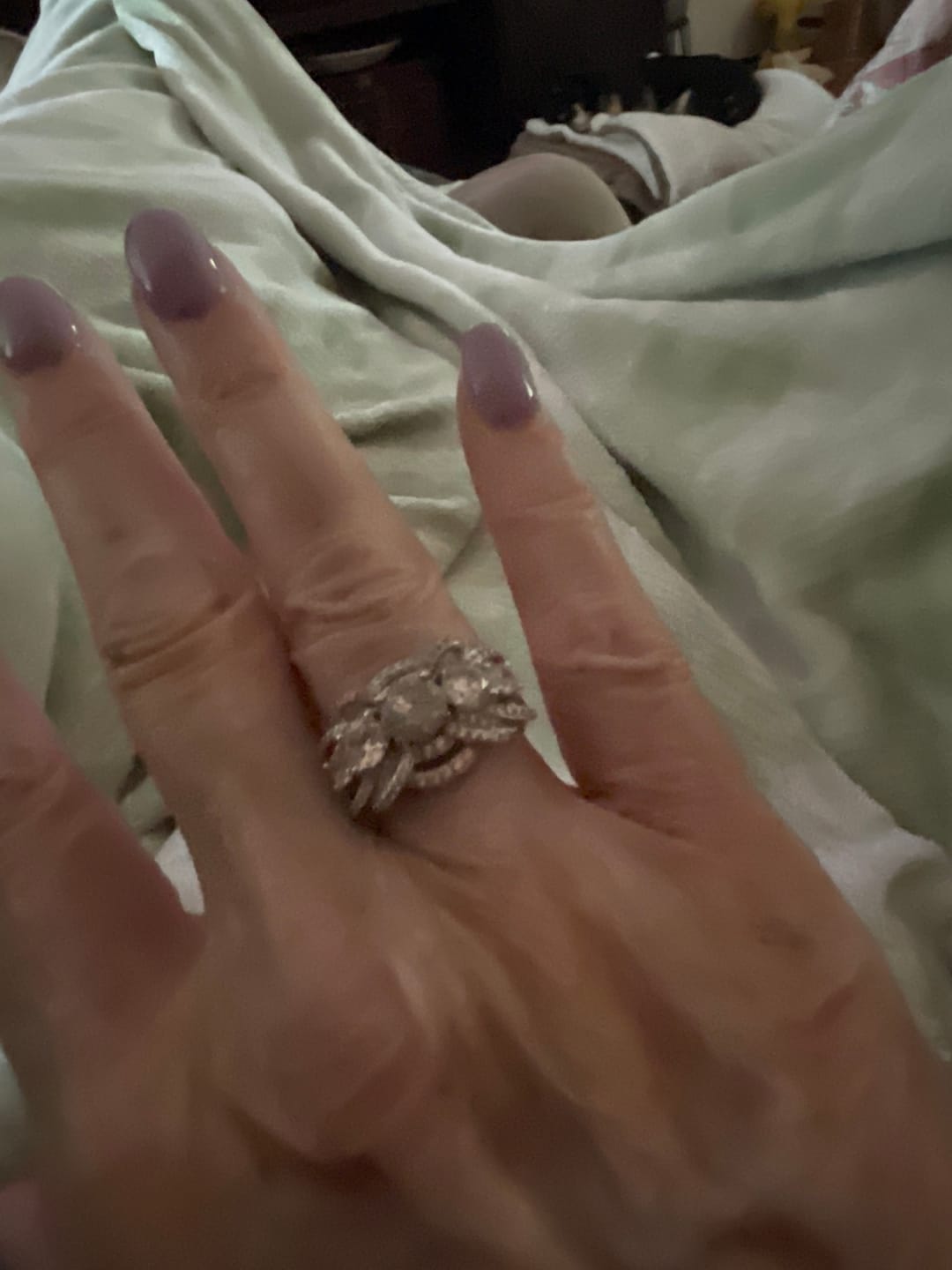 Customer photo review of Five Stone Round Moissanite Multi-Row Crossover Pave Engagement Ring
